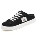 Stylische schwarze Canvas-Pantoletten mit weißen Schnürsenkeln und Plateausohle für Damen - 36 / Schwarz