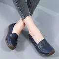 Comfortable navy blue women's loafers with soft gum sole and white contrast stitching. - Dark Blue