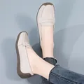 Elegant cream leather slip-on loafers for women with scalloped trim and gum sole - Off White