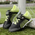 Professional youth soccer cleats in black and neon yellow with durable turf studs - 30 / Black