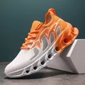 Men's breathable orange and white fly-knit running shoe with hollow shock-absorbing sole - 36 / Orange
