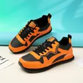 Zapatillas de running retro para mujer en naranja y negro para un uso diario versátil - 36 / Negro & Naranja