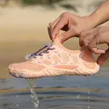Quick-dry peach water shoes for beach sports and surfing, shown dripping with water - 35 / Pink
