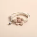 Cute cream colored pet collar featuring a soft plush flower and small silver bell charm - Flower Style / Apricot Floral