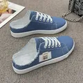 Casual blauwe denim canvas muiltjes sneakers voor dames met witte veters en rubberen zool - 35 / Blauw