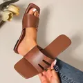 Stylish summer women's square toe flat slide sandals in brown faux leather with H-cut design - Brown