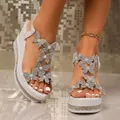 Elegant white wedge sandals featuring rhinestone butterfly and pearl accents for women - 35 / White
