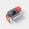Portable capsule-shaped pet waste bag dispenser in red and gray with a bag roll - Capsule Box + Waste Bag / Grey + Red
