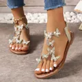 Elegant flat sandals with rhinestone butterflies and pearls for summer beach wear - 36 / Tan