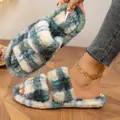 Close-up of blue plaid plush slippers with soft faux fur and double strap design. - 36-37 / Green