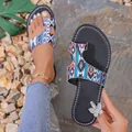 Detailed view of ethnic style women's toe-loop sandals with colorful geometric patterns - 36 / Multicolor Blue Stripe