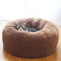 Comfortable plush round cat bed in chocolate brown long faux fur for winter warmth and soft touch - M / Brown