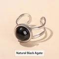 Natural black onyx gemstone ring in polished stainless steel with adjustable open band. - Outer Dia 13mm (Inner Dia 18mm) / Natural Black Onyx