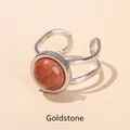 Minimalist adjustable titanium steel ring with a round sparkling goldstone cabochon - Outer Dia 13mm (Inner Dia 18mm) / Gold Sandstone