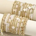 Ensemble de 5 bracelets empilables en perles dorées et nacrées avec croix blanches - Ensemble de Bracelets Superposés Combo Valeur (XY-1394*3+XY-396*3) / Ensemble de Bracelets Multi-pièces