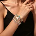 Ensemble de bracelets empilables multicouches avec perles et breloques en croix. - Bracelet de Perles Croix Rose Blanc Bleu (XY-2476) / Ensemble de Bracelets Multi-pièces