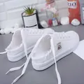 Witte canvas sneakers zonder achterkant met franjes en instapontwerp voor dames - 35 / Wit