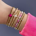 Lot de 5 bracelets élastiques en perles dorées avec croix roses et blanches au poignet - Ensemble de Perles en Croix Rose (XY-266) / Ensemble de Bracelets Multi-pièces