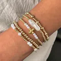 Ensemble de 5 bracelets en perles dorées avec perles blanches et croix pour femmes - Bracelet Croix Perle Baroque (XY-435) / Ensemble de Bracelets Multi-pièces