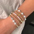 Ensemble de 5 bracelets bohèmes avec perles dorées, perles, croix et breloques étoiles - Bracelet Perle Croix Étoile (XY-436) / Ensemble de Bracelets Multi-pièces