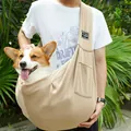 Close-up of khaki breathable pet sling carrier with a small dog sitting comfortably - Mesh Pocket Style / 75*50cm / Khaki