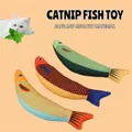 Three colorful fish-shaped catnip plush toys for cat molar and interactive play at home - Random Color