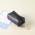 Portable black leather dog waste bag dispenser pouch with gold metal keychain clip attachment - Black
