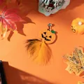 Festive Halloween cat toy accessory with pumpkin felt face and orange feather tail - No. 4 Pumpkin Feather Refill