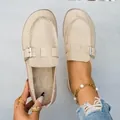 Comfortable beige faux suede clogs for women featuring a stylish metal buckle and platform sole - 36 / Beige