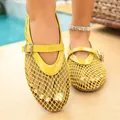 Detailed view of women's yellow mesh flat sandals with a heart-shaped metal buckle strap - 36 / Yellow Without Buckle