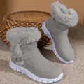 Side view of grey women's snow boots featuring plush faux fur lining and white sole - 35 / Gray
