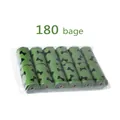Close-up detail view of 6 rolls of green biodegradable pet waste bags with bone prints - Bone Print / 1.5 Mil 12 Rolls