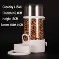 Close-up detail of automatic bird feeder with 415ml capacity and precise size markings - 415ml