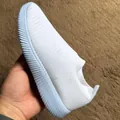Detailed side view of white breathable flyknit sock sneaker with elastic stretch fabric - 35 / White