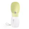 Portable pet water bottle featuring light green drinking trough and clear bottle body - Yellow