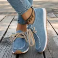 Detail view of blue suede ethnic loafers with braided rope laces and boho anklet - 36 / Blue