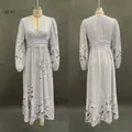 Front and back full view of gray V-neck floral pleated maxi dress on mannequin - S / Dresses / Light Gray