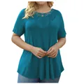 Detail view of an elegant teal short sleeve top with delicate lace crochet neckline decoration - Dark Green
