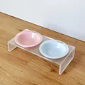 Moderne acryl dubbele voerbakhouder met pastelroze en blauwe keramieken bakjes - Roze & blauwe bakjes met dubbele standaard