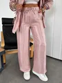 Detail view of pink shiny metallic wide-leg trousers with elastic drawstring waist - S / Bottoms / Pink