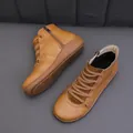 Retro brown women's flat ankle boots with side zippers and lace-up details - Tan