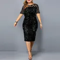 Detail view of black sequined party dress with mesh short sleeves and round neck - S / Dresses / Black