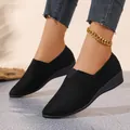 Elegant black suede wedge slip-on shoes for women featuring a stylish pointed toe design - 36 / Black