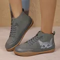 Close-up of grey high-top women's shoes featuring a cute cat print and casual design - 36 / Gray