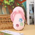 Pink plush flip-flop shaped squeaky dog toy with colorful embroidered paw prints and leopard pattern - Red Leopard Knot Plush Slipper