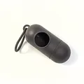 Portable black pill-shaped pet waste bag dispenser with attachment loop for leash - Empty Case / Black