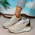 Women's stylish beige wedge sneakers with metallic heel and decorative zipper detail - Off White