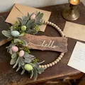 Easter wreath with wood beads, rabbit ear leaves, and colorful eggs for door decor - 35cm / 14 Inch / Wood Sign Rabbit Ear Leaf Artificial Wreath