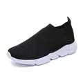 Breathable black fly knit slip-on sneakers with white chunky sole for women's activewear - 36 / Black