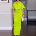 Detail of neon green two-piece outfit featuring cropped shirt and bodycon skirt - XS / Top And Bottom / Mint Green